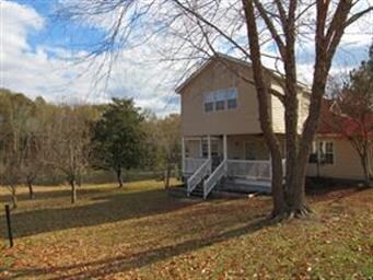 Another view of the front showing the pond.