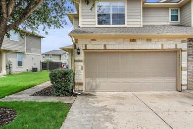 Garage with concrete driveway