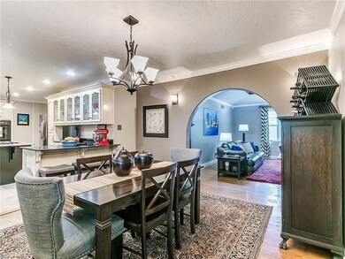 Dining area featuring an inviting chandelier, orna