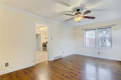 This living room is just right off the kitchen. Perfect place for entertaining guests.