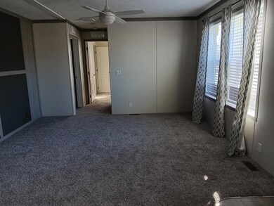 388 Sterling Dr unit 388, Windsor Charter Township, MI 48821 - photo 2