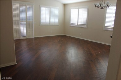 Family room shown from hallway shows quality shutt