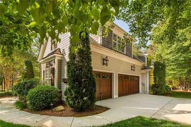 Oversized 3-car garage with solid wood doors...