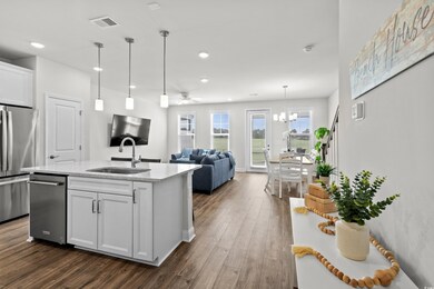 Kitchen featuring a sink, appliances with stainles