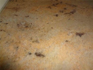 Granite surface in kitchen.