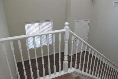 Looking down to front door/living room