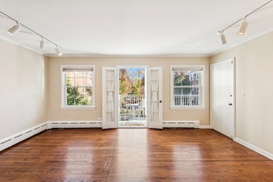 Hardwood floors and plenty of light! French doors