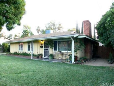 Alternate angle of front view with covered porch.