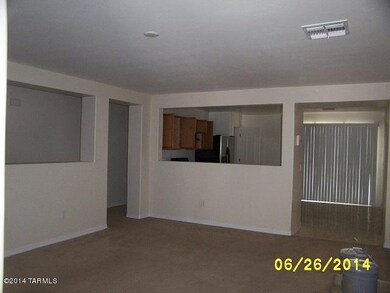 Living room looking into kitchen