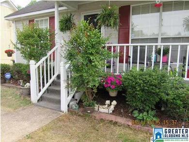 Beautifully landscaped, the front yard is both eye
