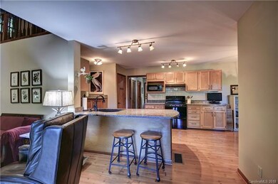 Breakfast Bar and Kitchen with Granite Counter Top