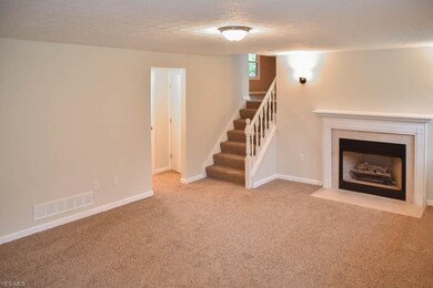 Family room with a fireplace.