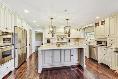 Dream kitchen!  Custom cabinetry offers ample stor