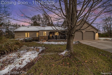 Evening view of ranch-style home
