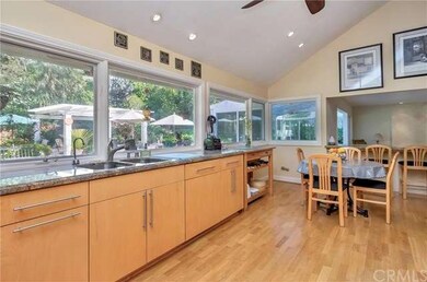 Kitchen with granite countertops, hardwood veneer 