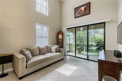 The living room and the dining room have high ceil