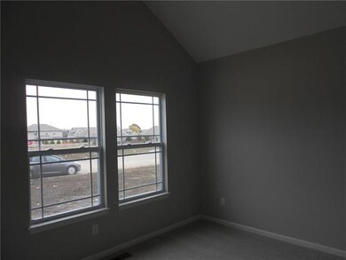 Third Bedroom with vaulted ceiling.