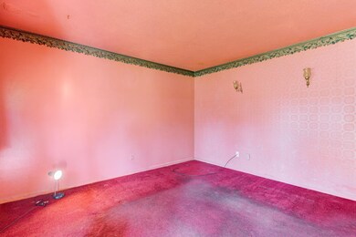Bedroom featuring carpet flooring