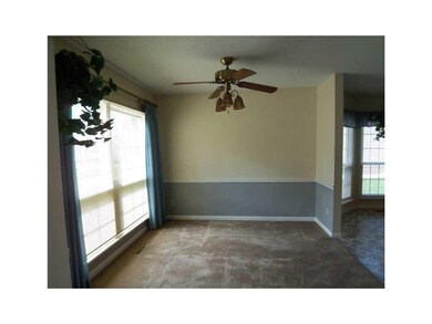 Dining Area. Chair rail, ceiling fan/light and dou
