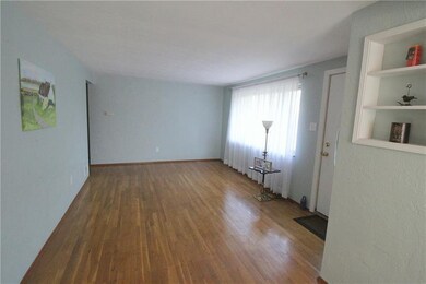 Living room - newer front door, built-in display c
