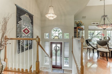 Bright split level entry with spacious formal dining room on the right.