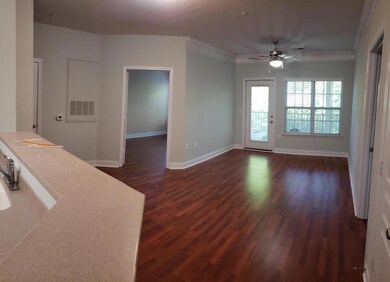 Open Dining to family with door to porch