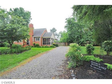 Exterior Front - The driveway leads to this beauti