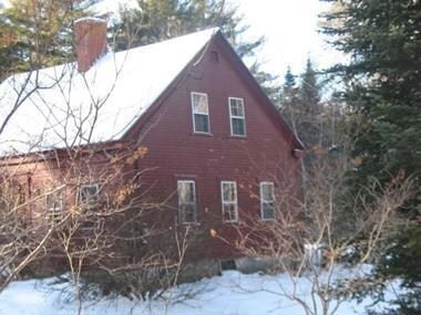 Current exterior side view. Home is...