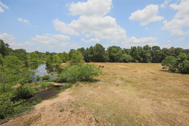 This is part of the whole 15.8 acres. The 5.8 acres is on the right side of the property and is wooded.