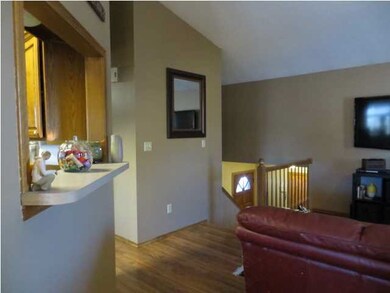 View of living room looking towards front entry an