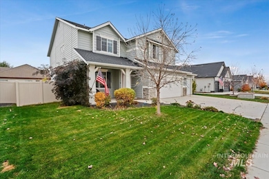 View of front of house with concrete driveway and a porch