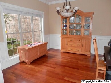 Currently used as a study/office the formal dining room is a great size with hardwood floors, high ceilings, and large picture window.