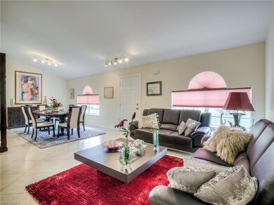 Formal living room looking into dining room