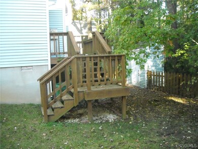 Back deck and detached toolshed.