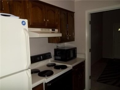 Side one of galley style kitchen. All appliances r