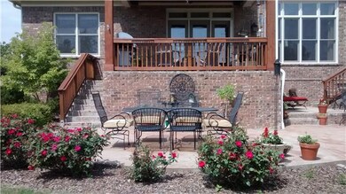 Another view of deck...beautiful landscaping.