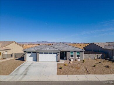 Single story home featuring a mountain view and a