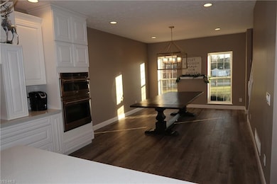 Flex room to the right off foyer is used as formal