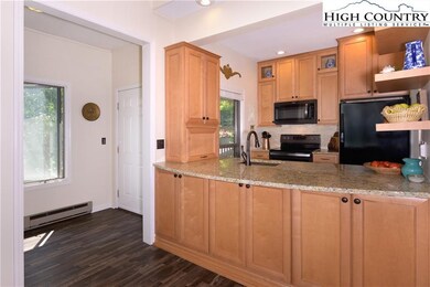 Looking towards foyer and additional storage under