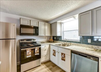 9911 Aquarius Dr unit 3, Port Richey, FL 34668 - photo 4