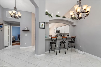 Hallway looking into kitchen and guest bedroom