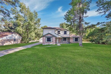 10071 Woodhollow Dr, Conroe, TX 77385 - photo 2