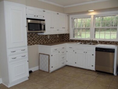 Every cook will love this kitchen w/th new cabinets, DW & microwave. 