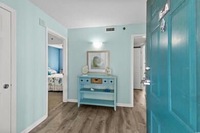 Hallway featuring hardwood / wood-style flooring