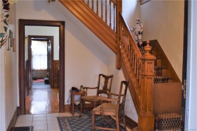 Two-Story Foyer with Grand Staircase.
