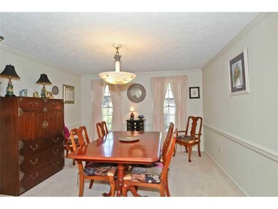 Dining Room. Elegant W/Hardwood Under Carpet