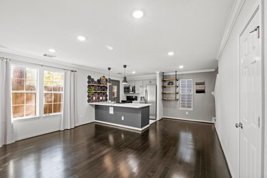 This incredible living room is open and bright! Fe