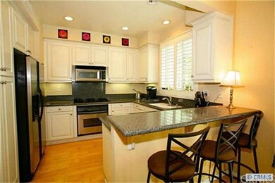Stainless steel appliances, double sink and an air