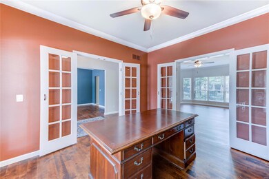 HOME OFFICE FEATURES 2 SETS OF FRENCH DOORS FOR A 