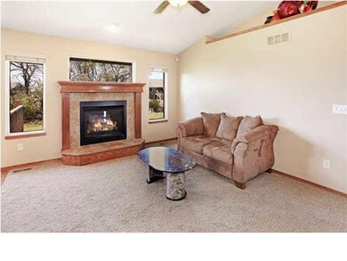 Living Room w/ gas burning fireplace.